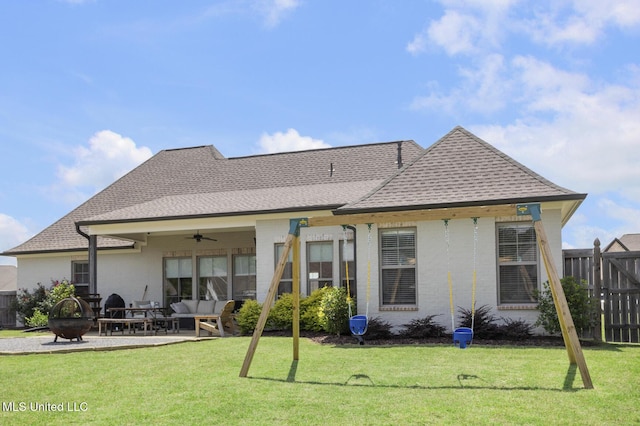 508 Forest Glen Ln, Brandon, MS 39047 - rear view of property with a ceiling fan, a fire pit, roof with shingles, a patio, and brick siding
