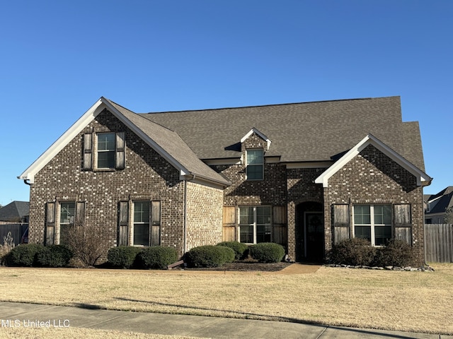 front of property featuring a front yard