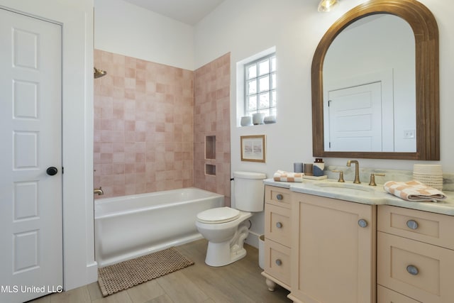 218 Front St, Pass Christian, MS 39571 - full bathroom with toilet, vanity, and shower / washtub combination