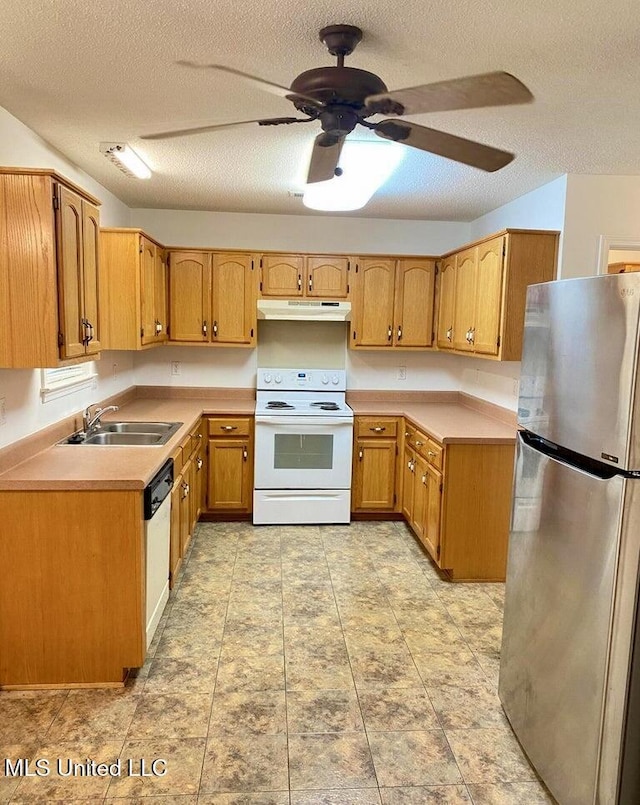 kitchen featuring dishwasher, sink, white electric range, stainless steel fridge, and a textured ceiling