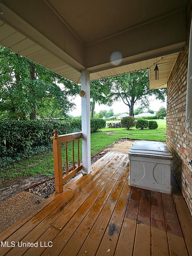 6936 Aulena Pl, Diamondhead, MS 39525 - wooden terrace with a lawn