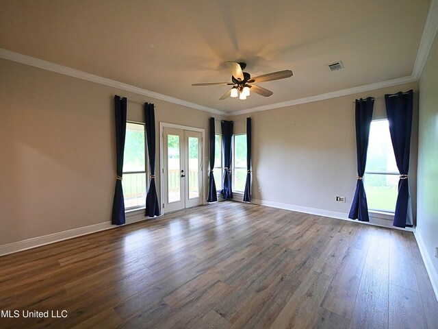 6936 Aulena Pl, Diamondhead, MS 39525 - empty room featuring french doors, dark wood-style floors, ceiling fan, and crown molding