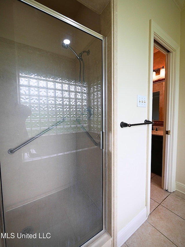 6936 Aulena Pl, Diamondhead, MS 39525 - full bath featuring a shower stall and tile patterned floors