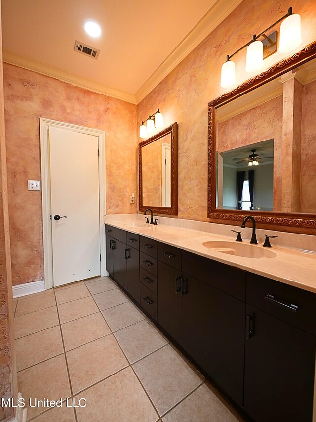 6936 Aulena Pl, Diamondhead, MS 39525 - full bathroom with double vanity, crown molding, tile patterned flooring, and a ceiling fan