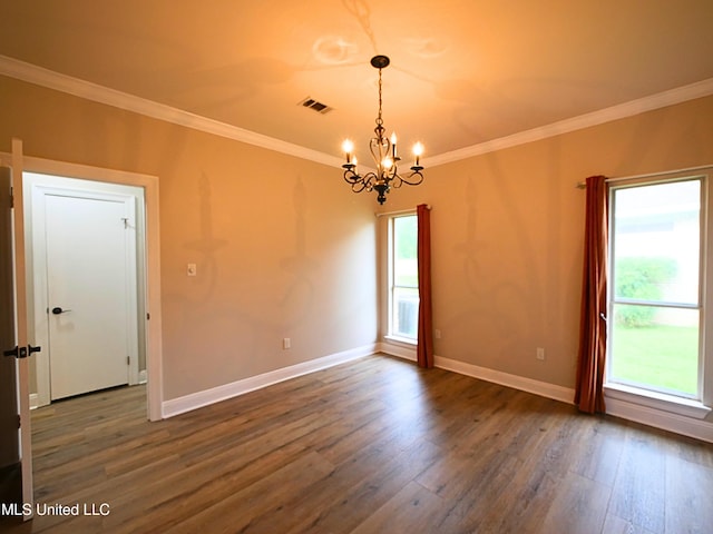 6936 Aulena Pl, Diamondhead, MS 39525 - spare room featuring a chandelier, dark wood-type flooring, and crown molding
