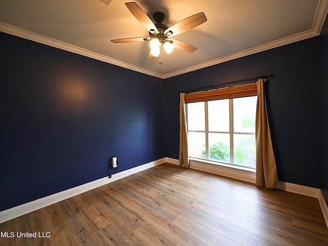 6936 Aulena Pl, Diamondhead, MS 39525 - unfurnished room featuring ceiling fan, crown molding, and wood finished floors