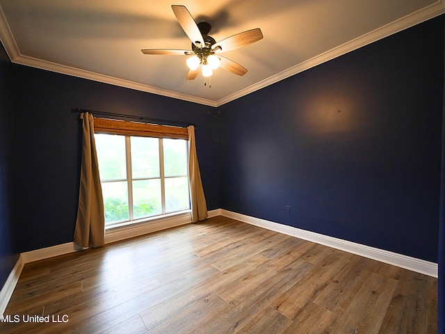 6936 Aulena Pl, Diamondhead, MS 39525 - unfurnished room featuring wood finished floors, a ceiling fan, and ornamental molding