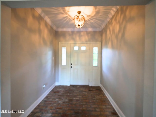 6936 Aulena Pl, Diamondhead, MS 39525 - foyer featuring brick floors and crown molding