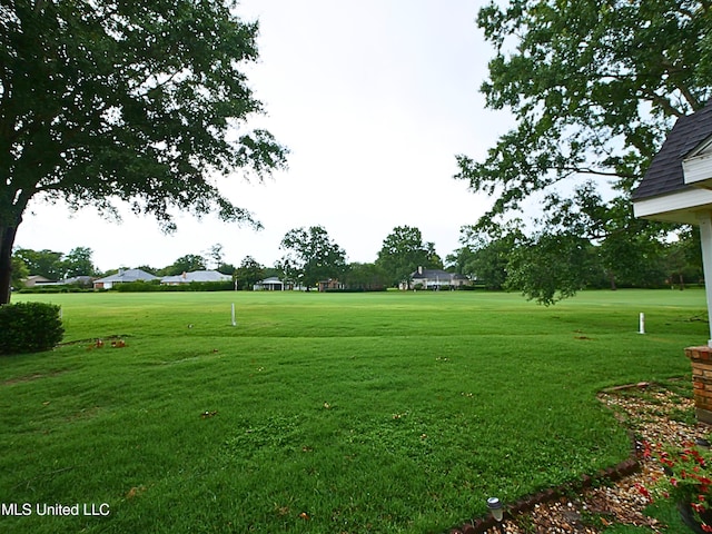 6936 Aulena Pl, Diamondhead, MS 39525 - view of home's community featuring a yard