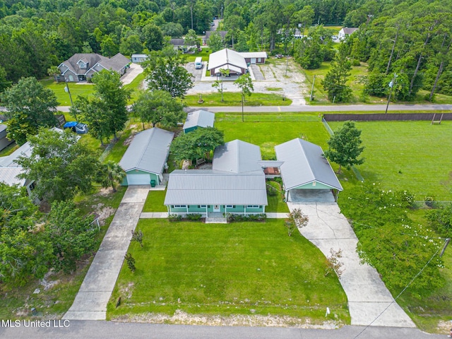 1025 Shipp St, Waveland, MS 39576 - aerial perspective of suburban area with a heavily wooded area