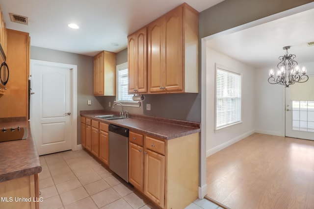 1025 Shipp St, Waveland, MS 39576 - kitchen with dishwasher, a sink, dark countertops, baseboards, and recessed lighting