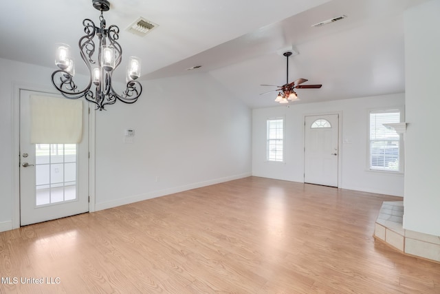 1025 Shipp St, Waveland, MS 39576 - entryway featuring a ceiling fan, a chandelier, light wood-style flooring, lofted ceiling, and baseboards