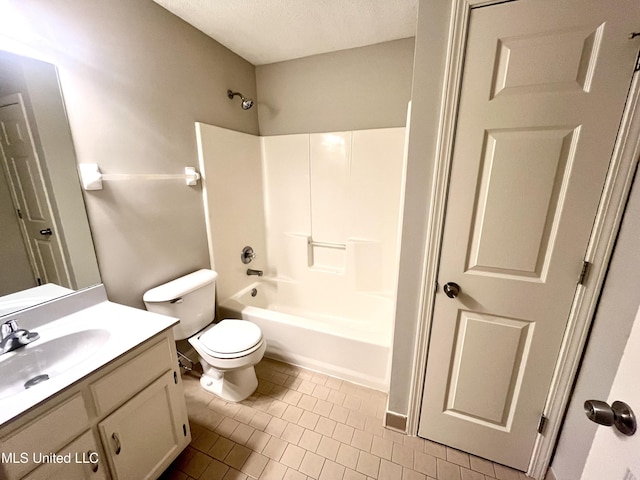 7827 S Chesterfield Dr, Southaven, MS 38671 - full bathroom featuring vanity, shower / washtub combination, toilet, tile patterned flooring, and a textured ceiling