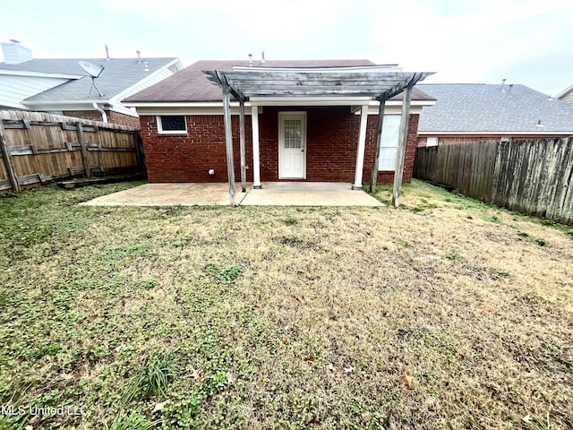 7827 S Chesterfield Dr, Southaven, MS 38671 - back of property featuring a pergola, a patio area, and brick siding
