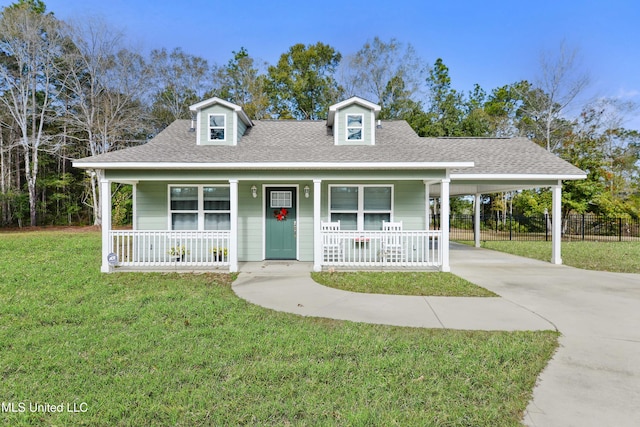 13701 Jericho Rd, Vancleave, MS 39565 - view of front of home with covered porch, a carport, concrete driveway, and roof with shingles