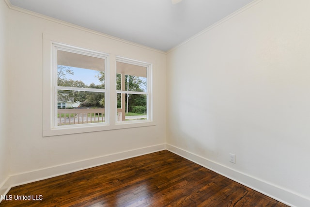 2312 6th Ave, Gulfport, MS 39501 - unfurnished room with ornamental molding, baseboards, and dark wood-style flooring