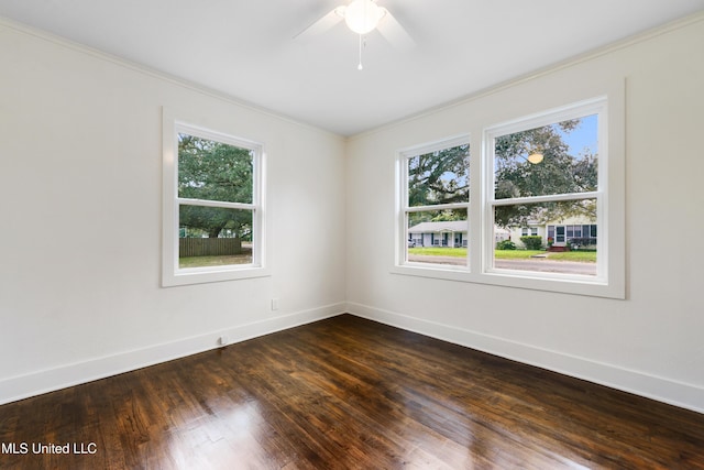 2312 6th Ave, Gulfport, MS 39501 - empty room with dark wood-type flooring, baseboards, ornamental molding, and ceiling fan