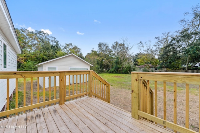 2312 6th Ave, Gulfport, MS 39501 - deck featuring a lawn and view of wooded area