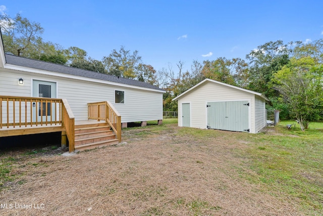 2312 6th Ave, Gulfport, MS 39501 - back of property featuring a deck, a lawn, and roof with shingles