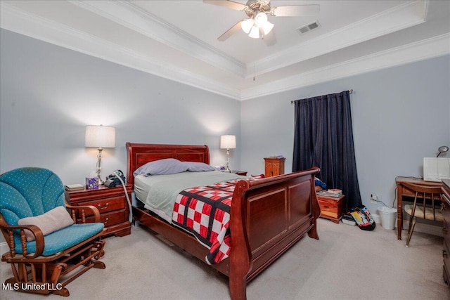 3753 Kenton Dr, Southaven, MS 38672 - carpeted bedroom featuring crown molding, a tray ceiling, and ceiling fan