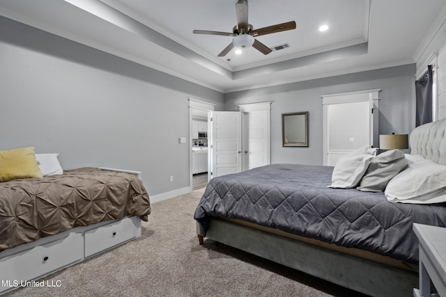 carpeted bedroom with crown molding, a raised ceiling, and ceiling fan