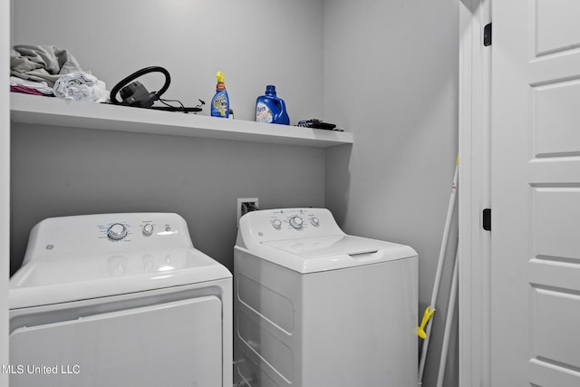 laundry area with washer and dryer