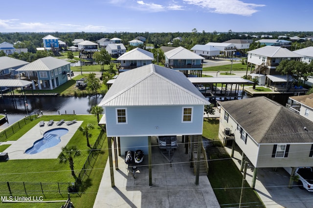 birds eye view of property featuring a water view