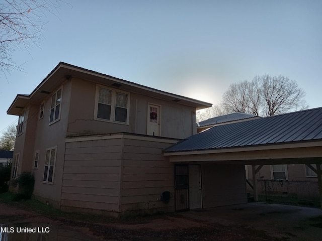 109 E Percy St, Indianola, MS 38751 - view of front of home with metal roof and an attached carport