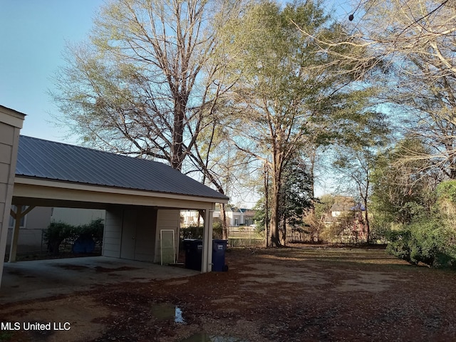 109 E Percy St, Indianola, MS 38751 - view of side of home with metal roof