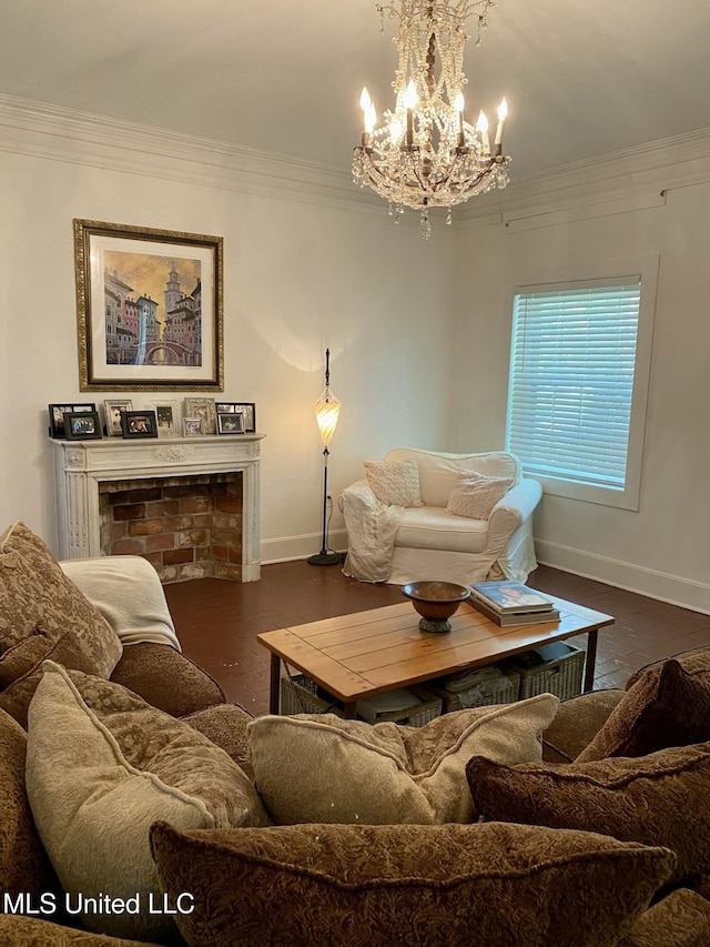 living area featuring a fireplace, wood finished floors, baseboards, ornamental molding, and an inviting chandelier