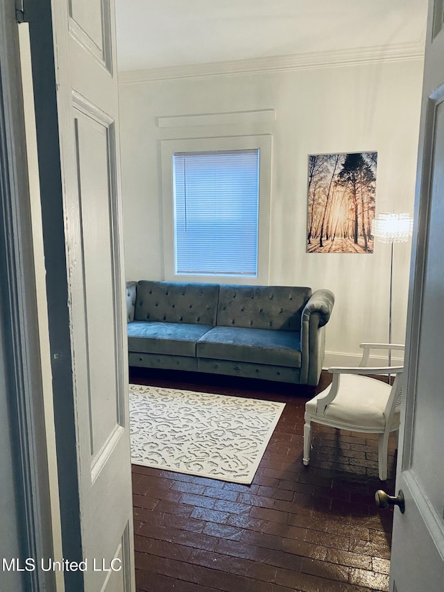 living room with brick floor and ornamental molding