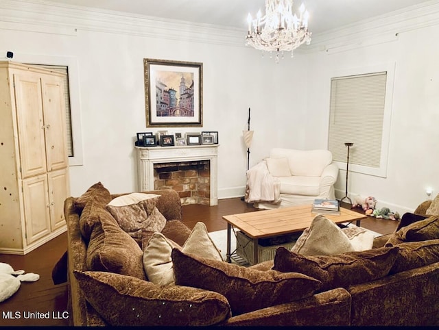 living room featuring a chandelier, dark wood-style flooring, a fireplace, baseboards, and crown molding