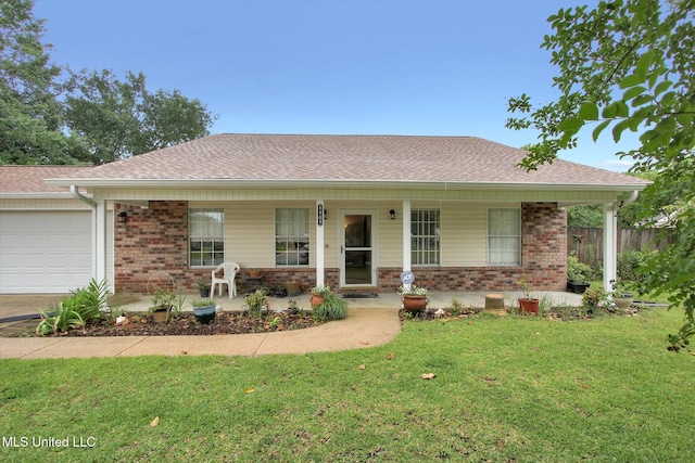8809 Old Walnut Rd, Ocean Springs, MS 39564 - ranch-style home featuring covered porch, a garage, brick siding, and roof with shingles