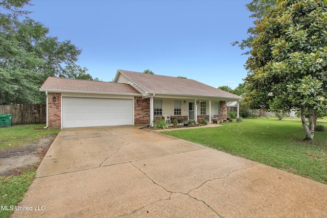 8809 Old Walnut Rd, Ocean Springs, MS 39564 - ranch-style home featuring brick siding, covered porch, an attached garage, driveway, and roof with shingles