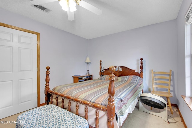 8809 Old Walnut Rd, Ocean Springs, MS 39564 - carpeted bedroom with baseboards and ceiling fan