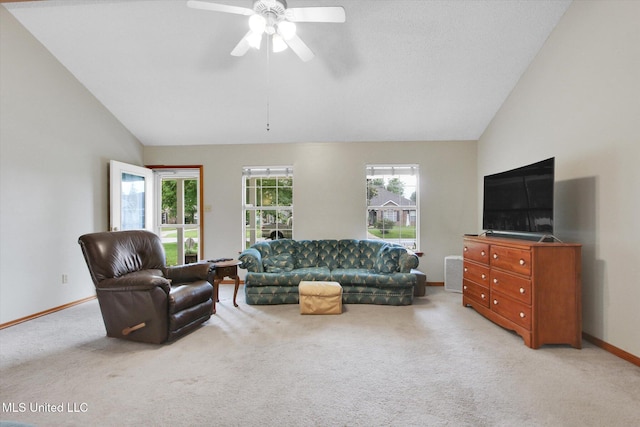 8809 Old Walnut Rd, Ocean Springs, MS 39564 - carpeted living room with baseboards, ceiling fan, and high vaulted ceiling