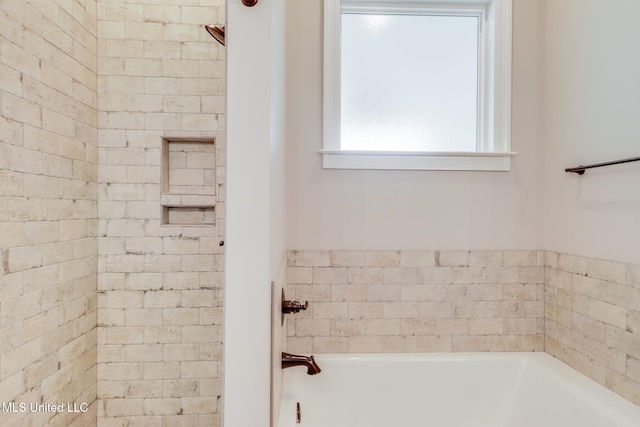 bathroom featuring a garden tub