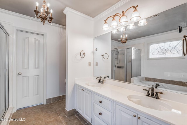 bathroom featuring tile patterned flooring, a chandelier, vanity, independent shower and bath, and ornamental molding