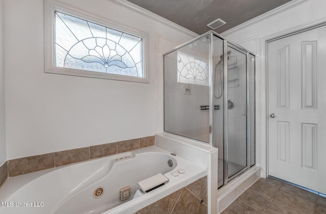 bathroom with tile patterned flooring, separate shower and tub, and ornamental molding