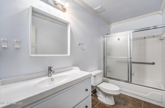 full bathroom featuring toilet, vanity, enclosed tub / shower combo, and ornamental molding