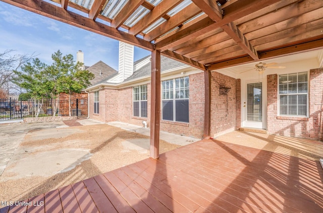 wooden deck with ceiling fan