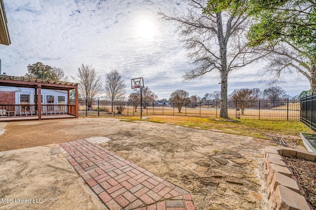 view of patio / terrace featuring basketball hoop