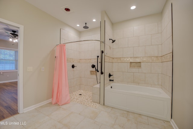 bathroom featuring hardwood / wood-style floors, ceiling fan, and shower / bath combination with curtain