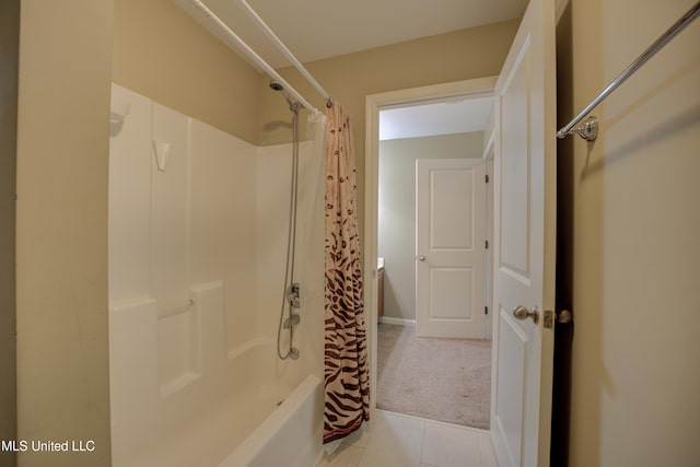 bathroom featuring tile patterned floors and shower / tub combo with curtain