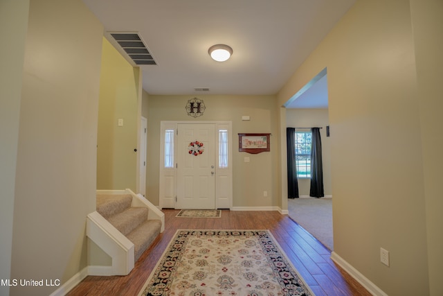 foyer entrance featuring hardwood / wood-style flooring