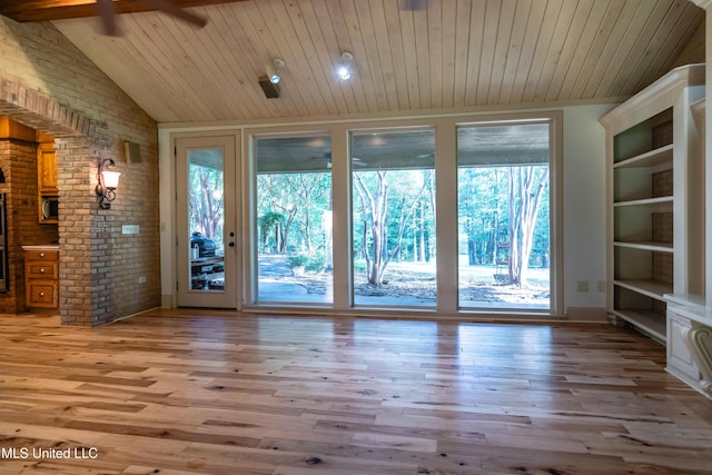 6147 Wirtz Rd, Flowood, MS 39232 - entryway featuring wood ceiling, ceiling fan, vaulted ceiling, light wood-style floors, and brick wall