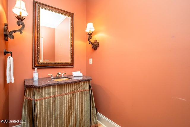 6147 Wirtz Rd, Flowood, MS 39232 - bathroom with vanity and baseboards