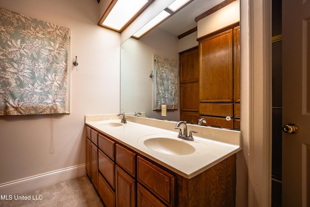 6147 Wirtz Rd, Flowood, MS 39232 - full bath featuring double vanity and baseboards