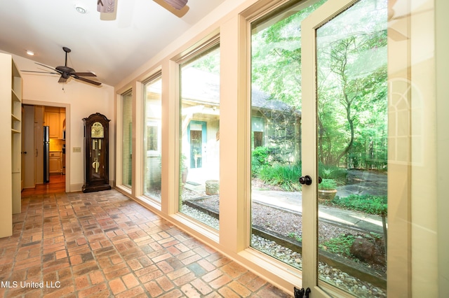 6147 Wirtz Rd, Flowood, MS 39232 - doorway featuring a ceiling fan, brick floors, and recessed lighting