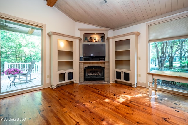 6147 Wirtz Rd, Flowood, MS 39232 - unfurnished living room featuring vaulted ceiling, built in shelves, a fireplace, wood-type flooring, and wooden ceiling